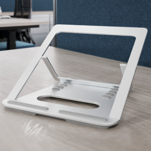 silver laptop riser on desk