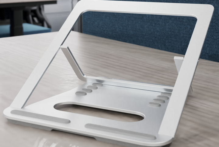 silver laptop riser on desk